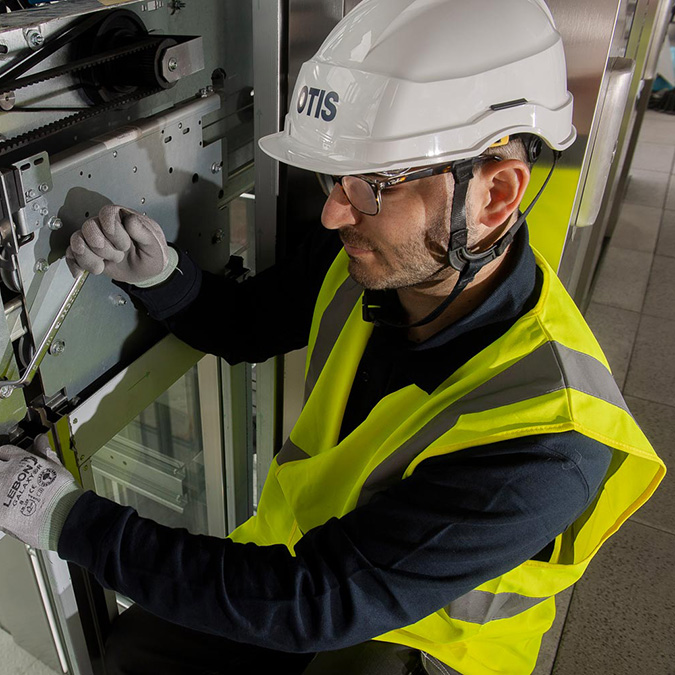 Otis technician working in the field