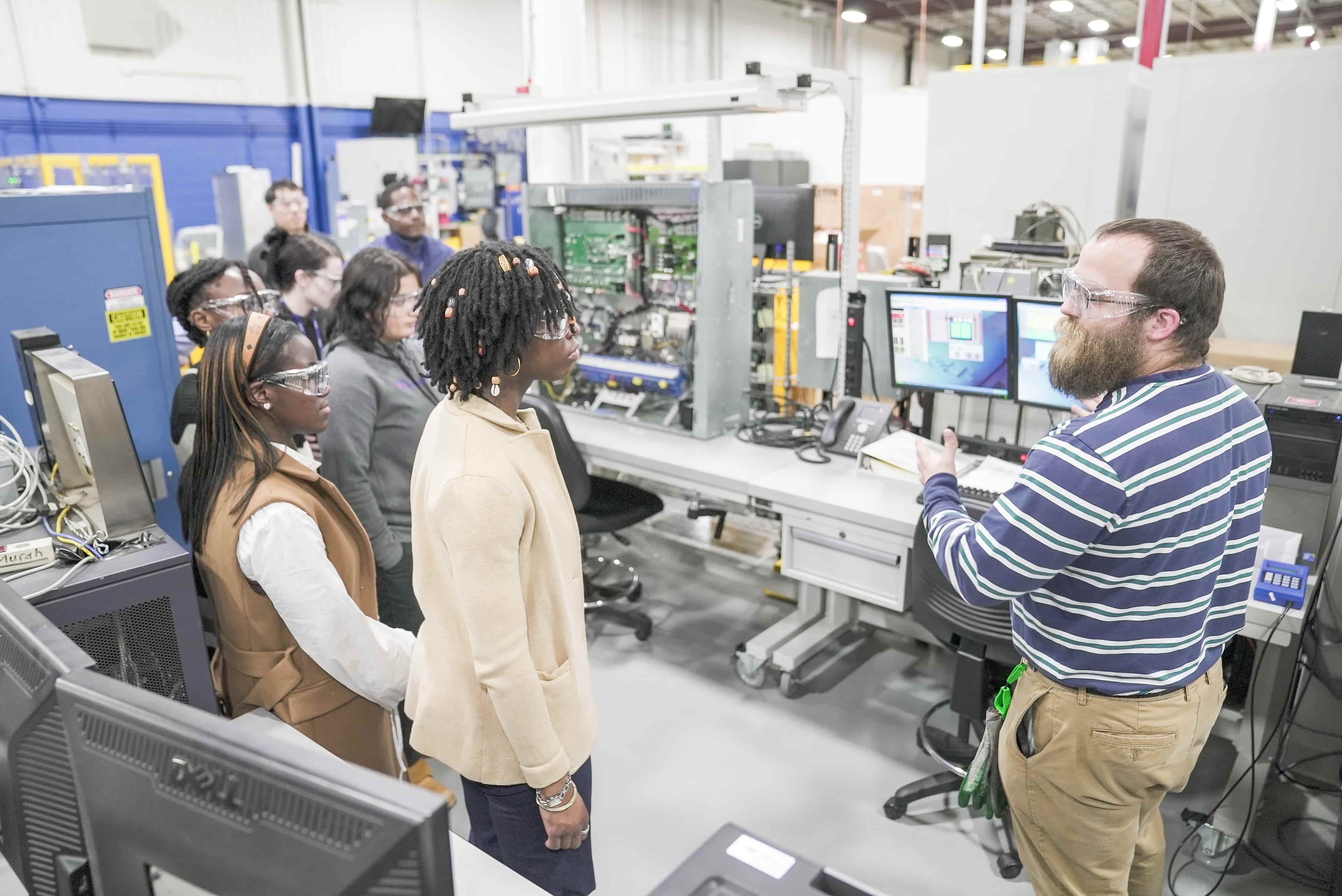 Students visiting the Otis Service Center in Connecticut.