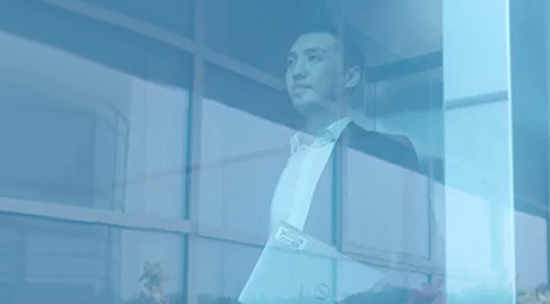 Business man looking out a window